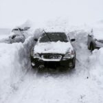 Car Surrounded by Snow